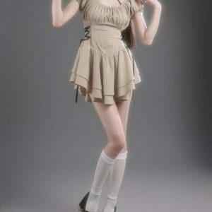 Chic Beige Coquette Mini Dress with Bow Detail - Trendy Long Sleeve Bodycon Style