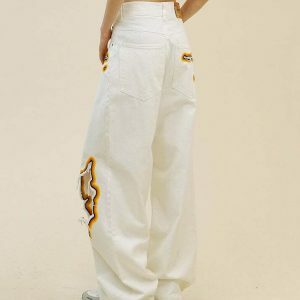 Trendy Feel The Burn Cut-Out Jeans with Star Patch and Ripped Details for Y2K Style